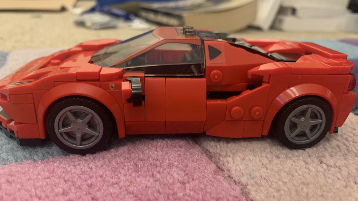 Those tiny Ferrari prancing horse shields are easy to miss when you're assembling the model and you don't want to take the model apart to find them later! The overall profile of the LEGO F8 is low and sleek - only three studs are even visible from the side.